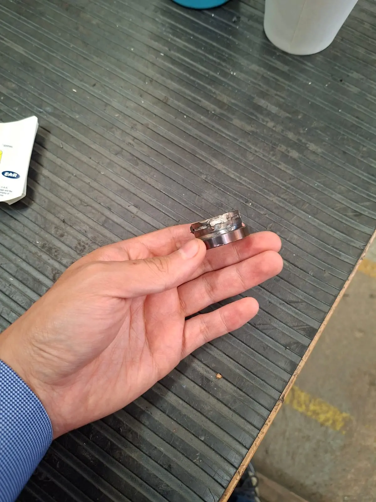 Failed bushing detail — mold pin wear