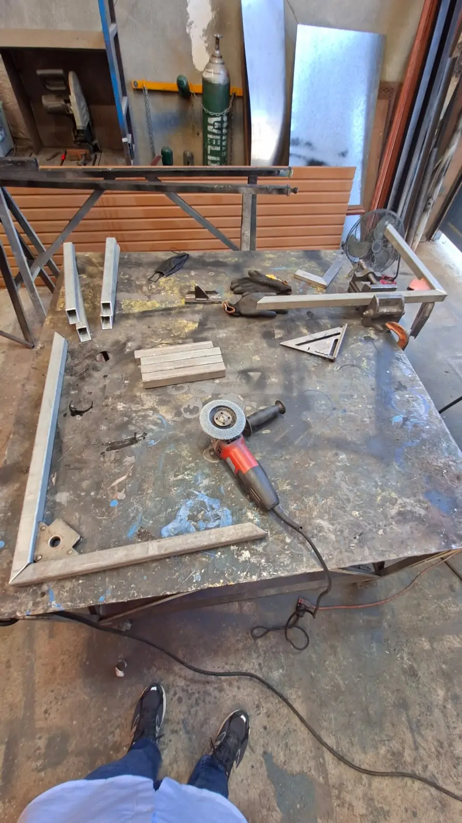 Profile prep with grinder before welding the frame