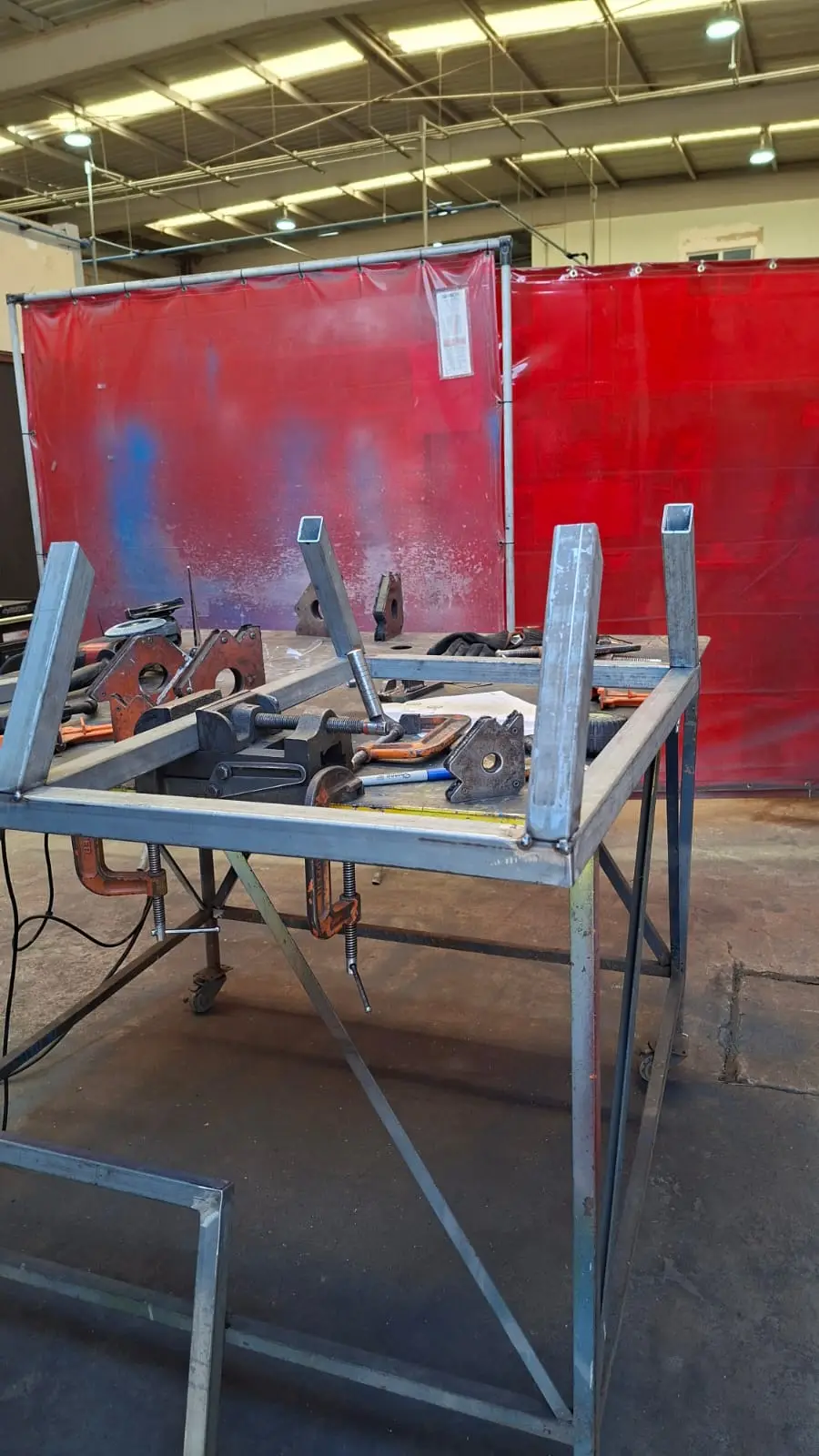 Tack welding and fixturing of the frame with clamps and magnetic squares