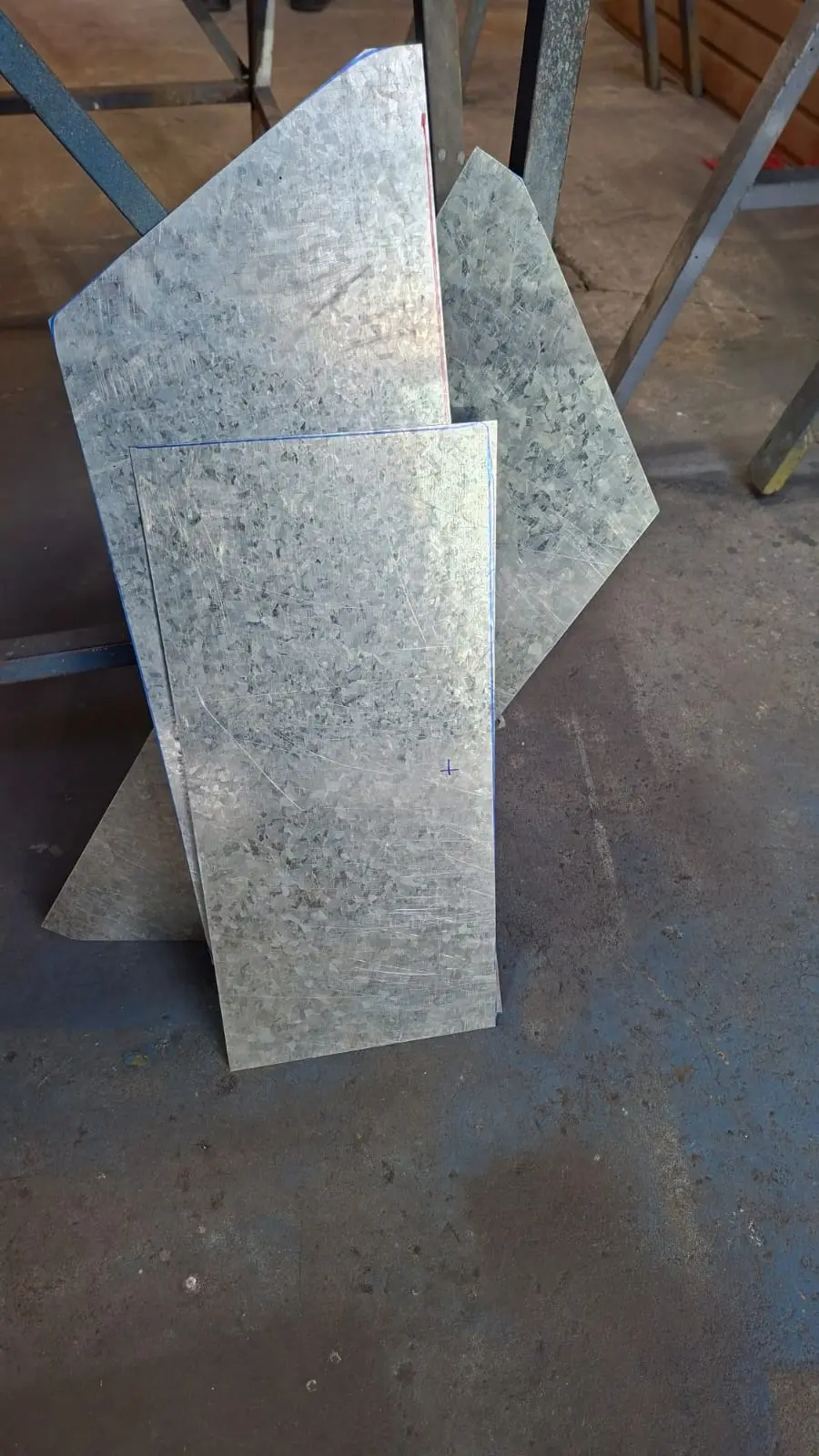 Galvanized sheets cut to size for cladding the prototype cart